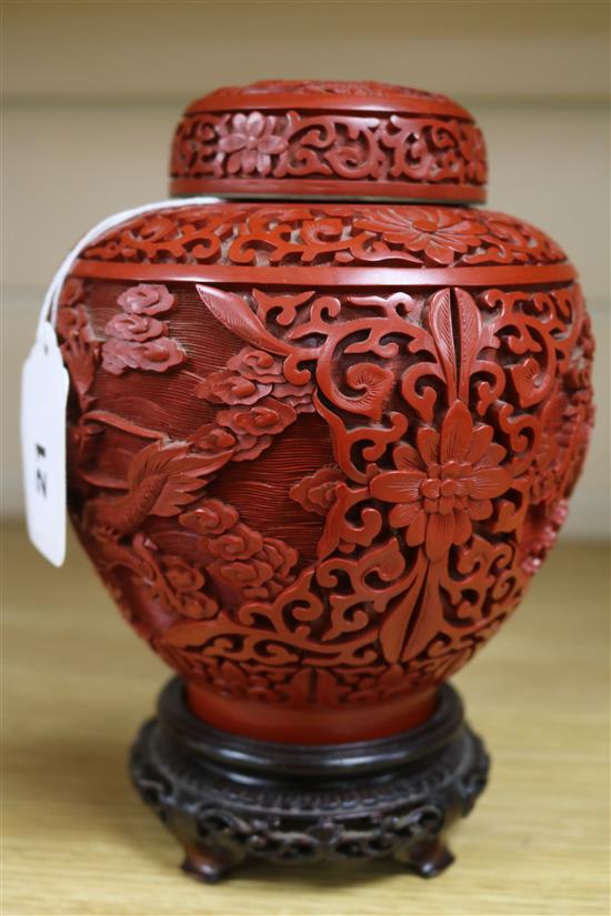 A Chinese cinnabar lacquer jar and cover